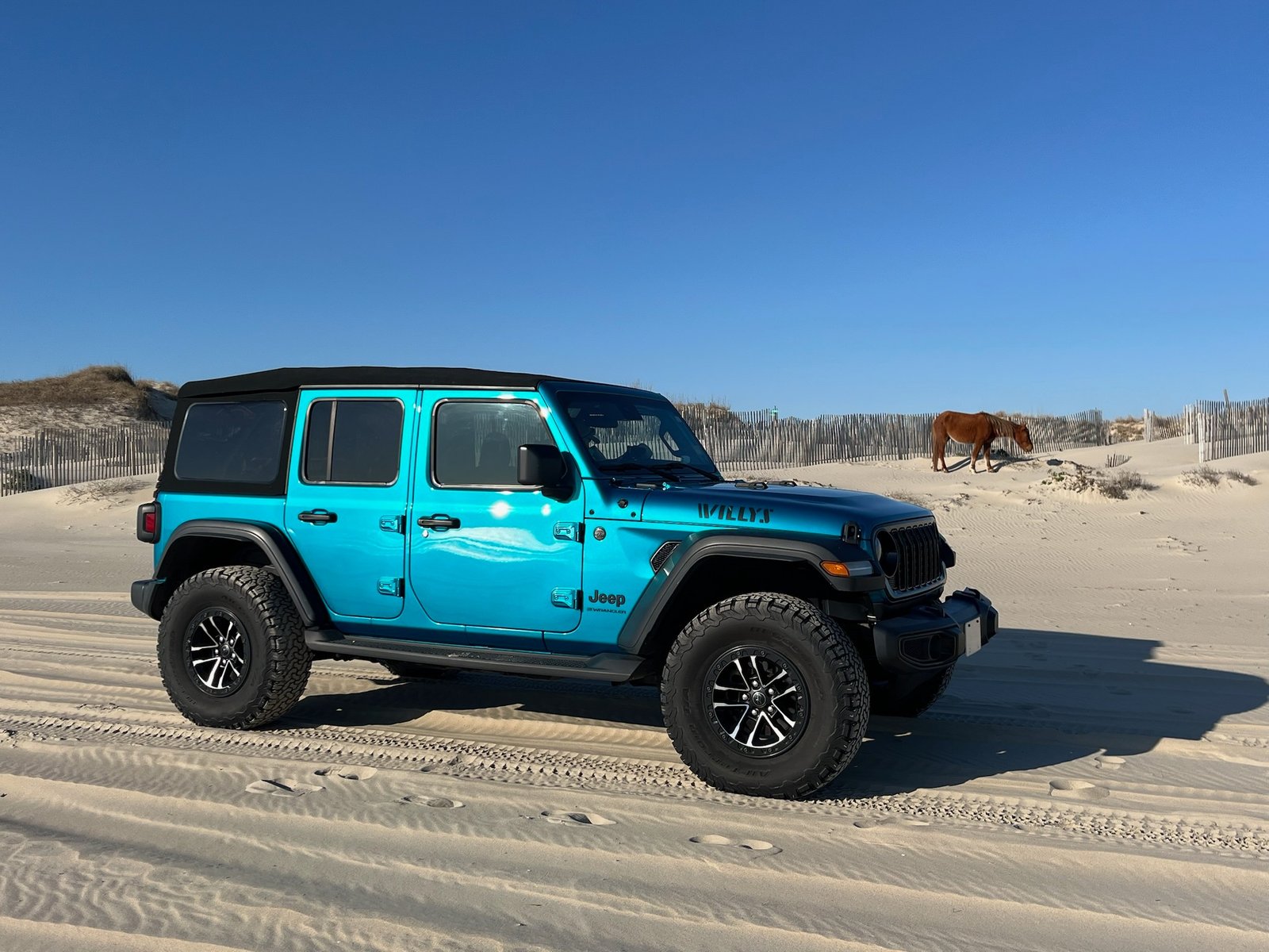 Jeep Wrangler rental staged for the beach